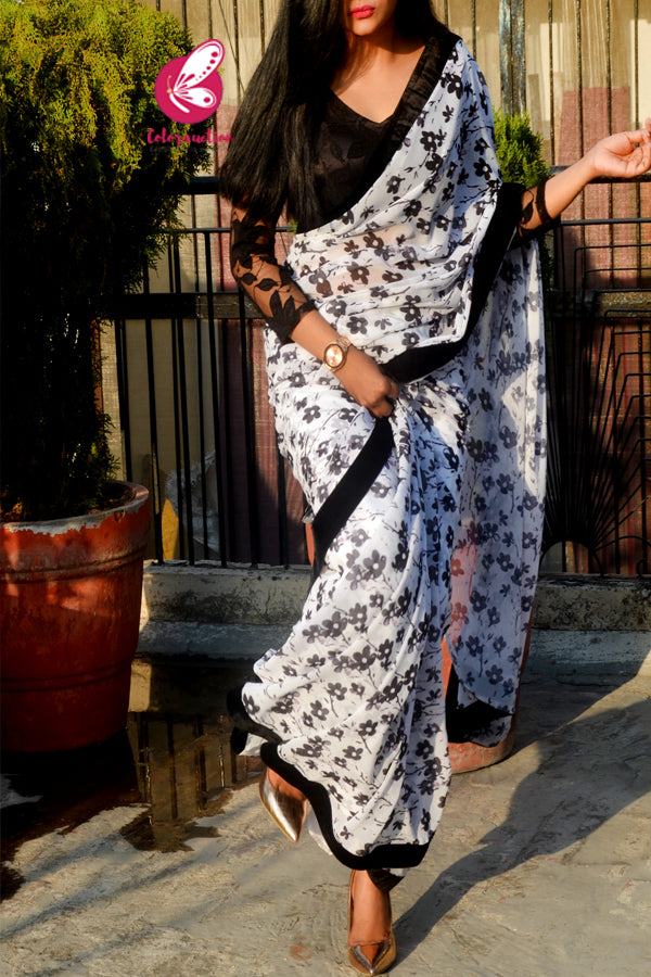 Off White and Black Georgette Black Velvet Taping Saree