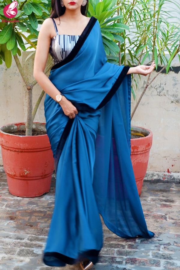 Teal Blue Silk Georgette Black Velvet Taping Saree
