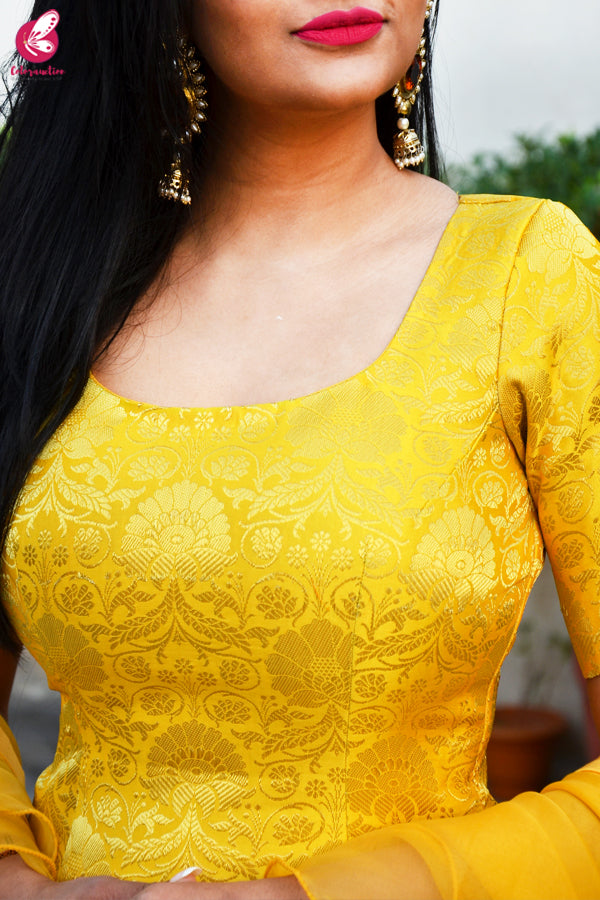 Yellow Brocade Padded Kurta with Yellow Crepe Skirt and Yellow Pure Organza Ruffle Dupatta